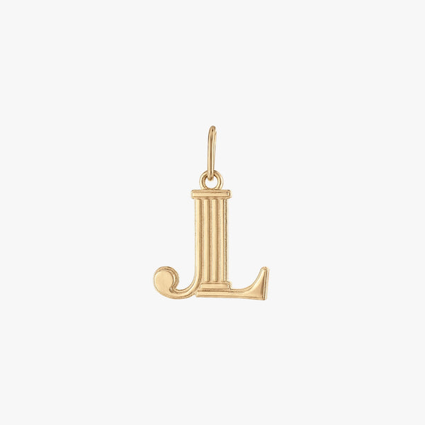 A gold pendant in the shape of the letter L with a logo charm design.