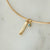 2026 Grad Layering Bar shown on Neck Collar with Blue Topaz Gemstone in gold