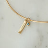 2026 Grad Layering Bar shown on Neck Collar with Blue Topaz Gemstone in gold