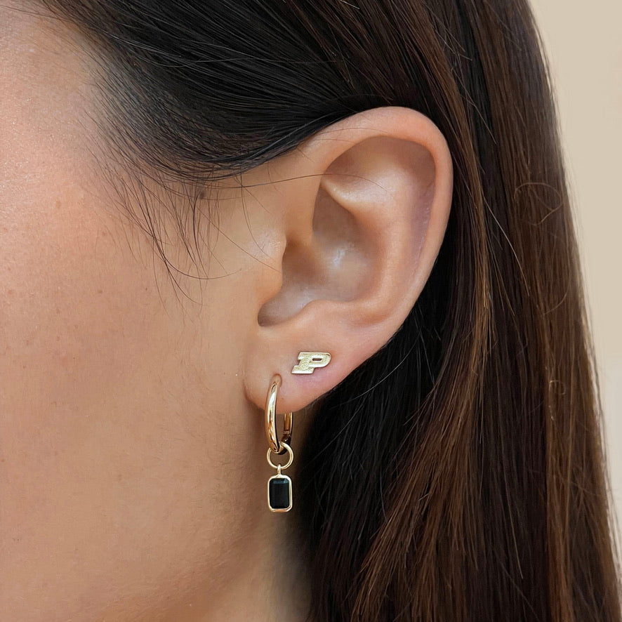 Purdue P Stud Earring on figure