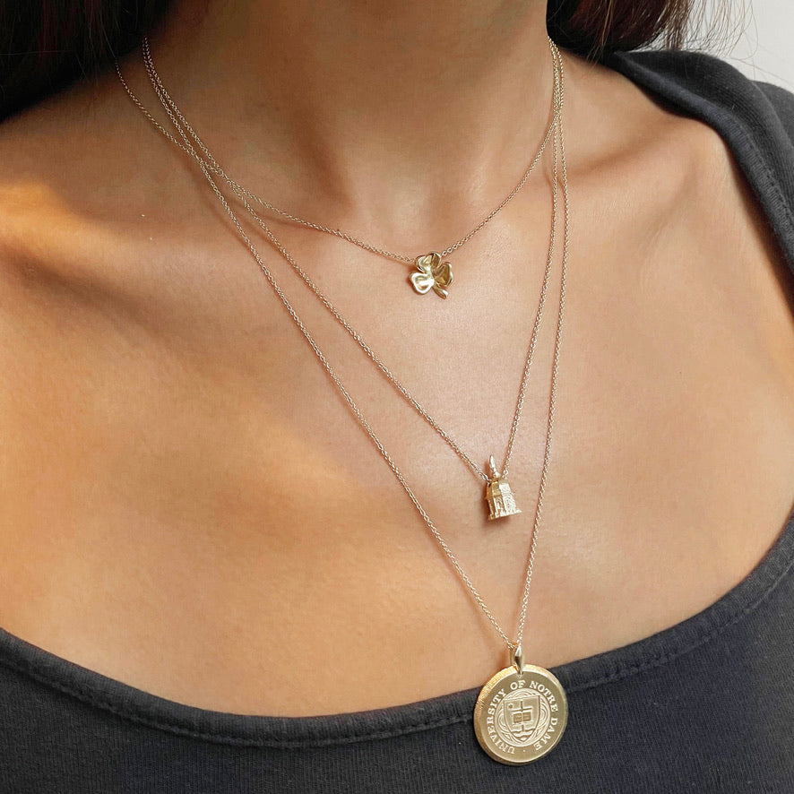 Notre Dame Golden Dome Pendant on figure