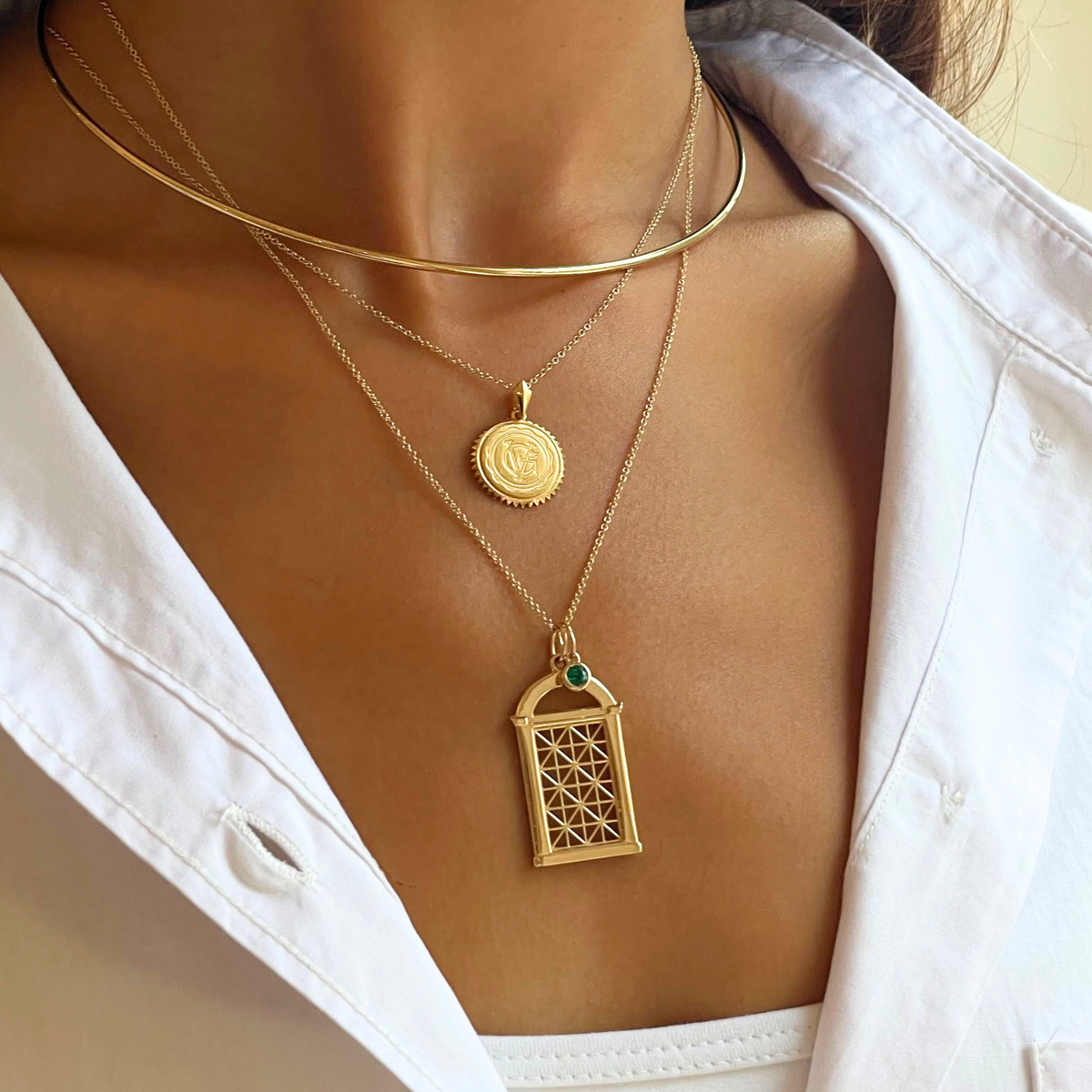 Georgetown Visitation Gate Pendant on figure
