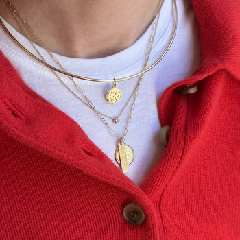 AOPi Rose Charm shown on figure in gold on Neck Collar with AOPi Layering Bar and Sunburst in gold on Link Chain