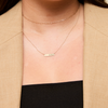 Alpha Chi Omega Horizontal Bar Necklace shown on figure in gold