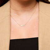 Alpha Chi Omega Horizontal Bar Necklace shown on figure in gold
