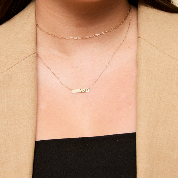 Alpha Chi Omega Horizontal Bar Necklace shown on figure in gold