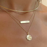 Alpha Omicron Pi Rose Charm on figure