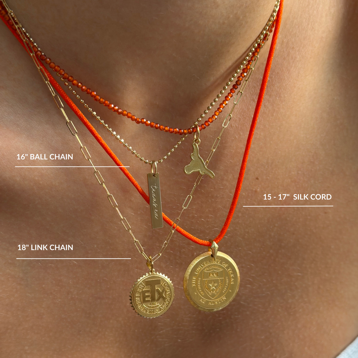 Close-up of a person's neck wearing layered gold necklaces with orange cords and small pendants, with overlaid text labels identifying the chain styles and cord lengths.