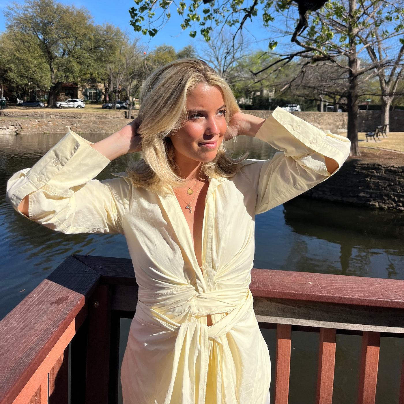 SMU Seal Sunburst Pendant shown on figure in gold on Cable Chain with Kappa Kappa Gamma Charm Bundle in Gold