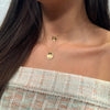 Columbia C Necklace shown on figure in gold