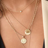 Colorado Sunburst shown on figure in gold on Link Chain with Buffs Organic Necklace