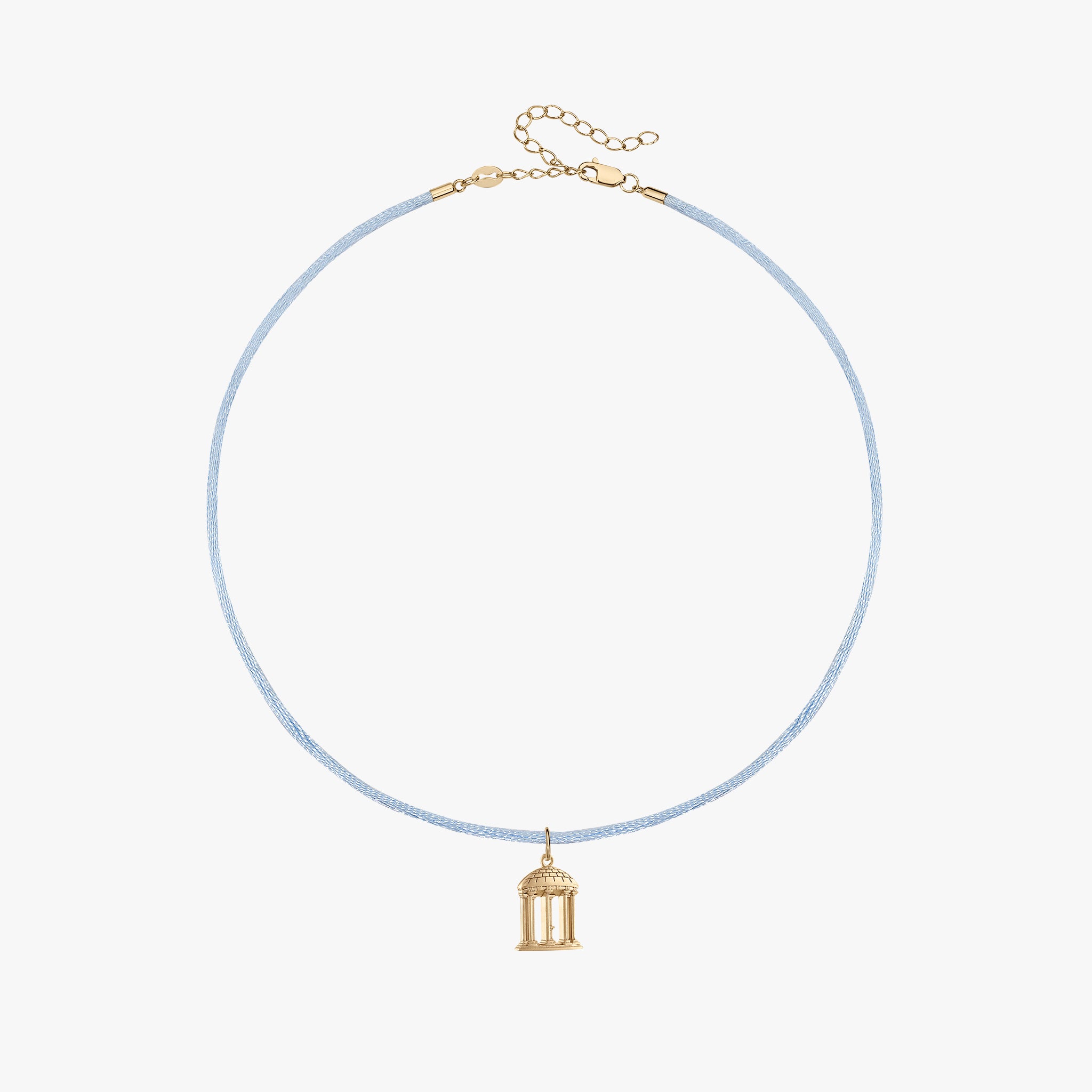 A delicate light blue beaded necklace with a small gold birdcage pendant, displayed on a clean white background.