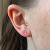 Delta Gamma Anchor Stud shown on figure in gold