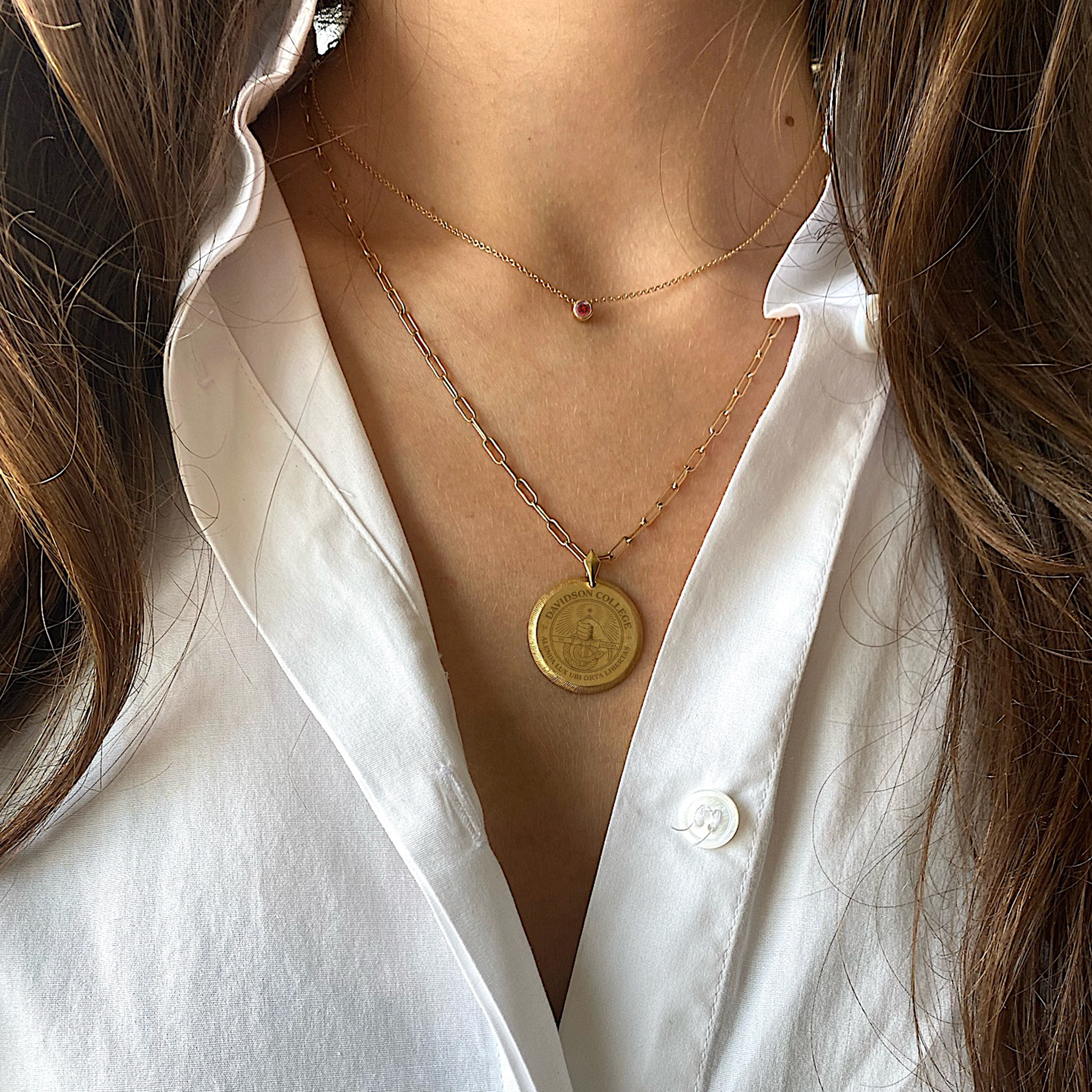 Davidson Florentine Pendant shown on figure in gold on Link Chain with Garnet Gemstone Necklace