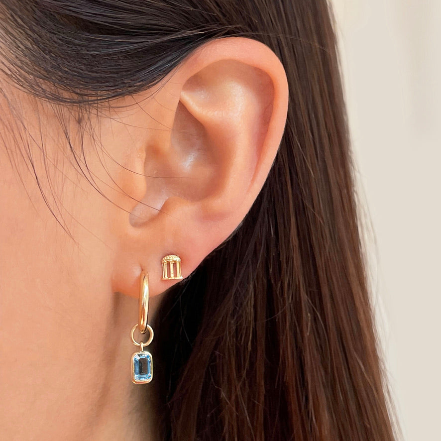 UNC Old Well Stud Earring on figure