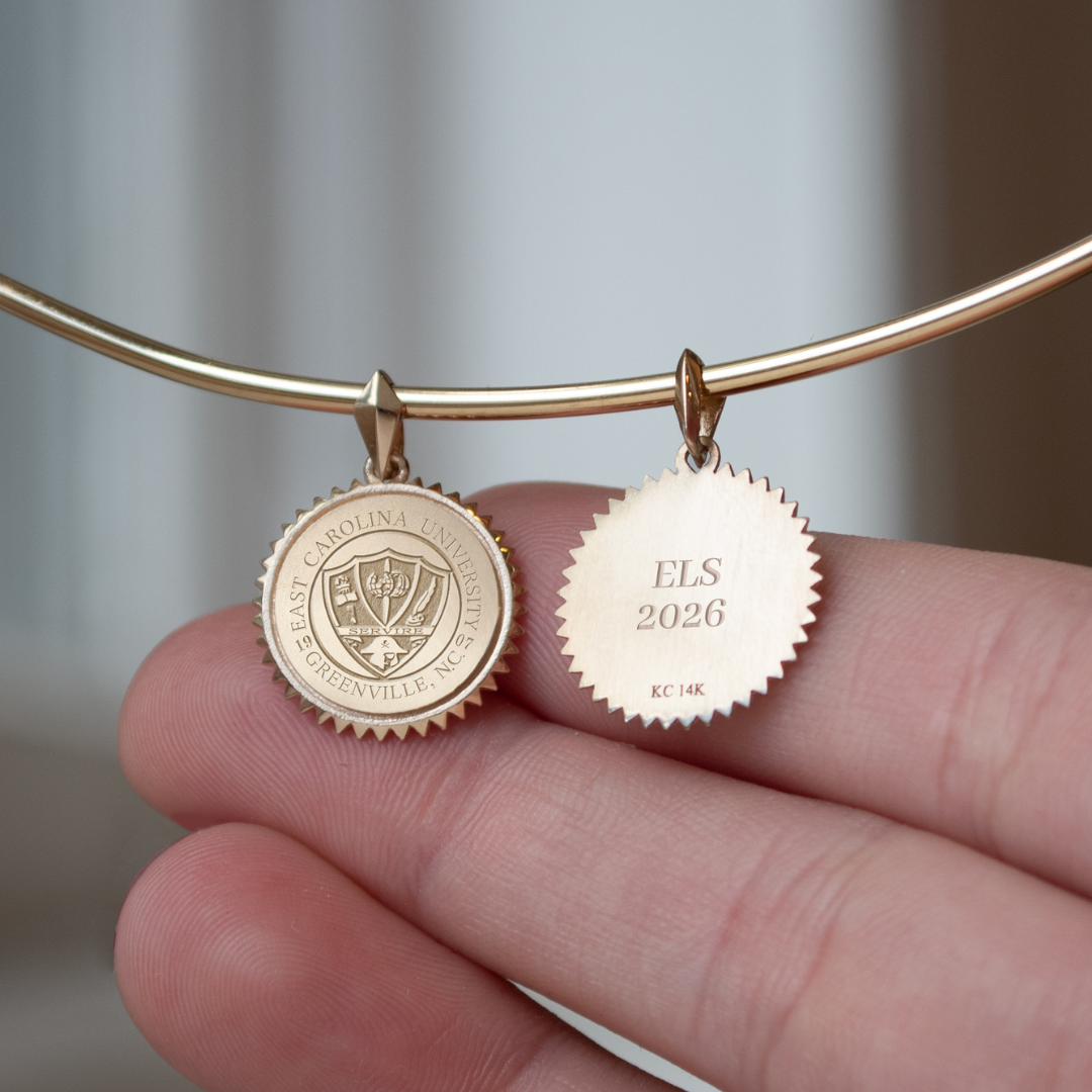 ECU Sunburst Pendant shown on Neck Collar in Gold with personalized back engraving