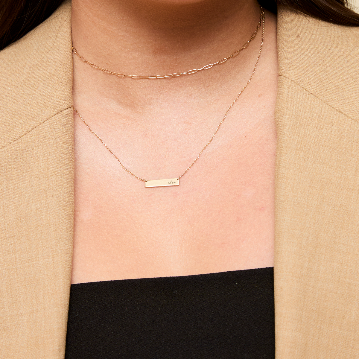 Elon Horizontal Bar Necklace shown on figure in gold with Link Chain Choker