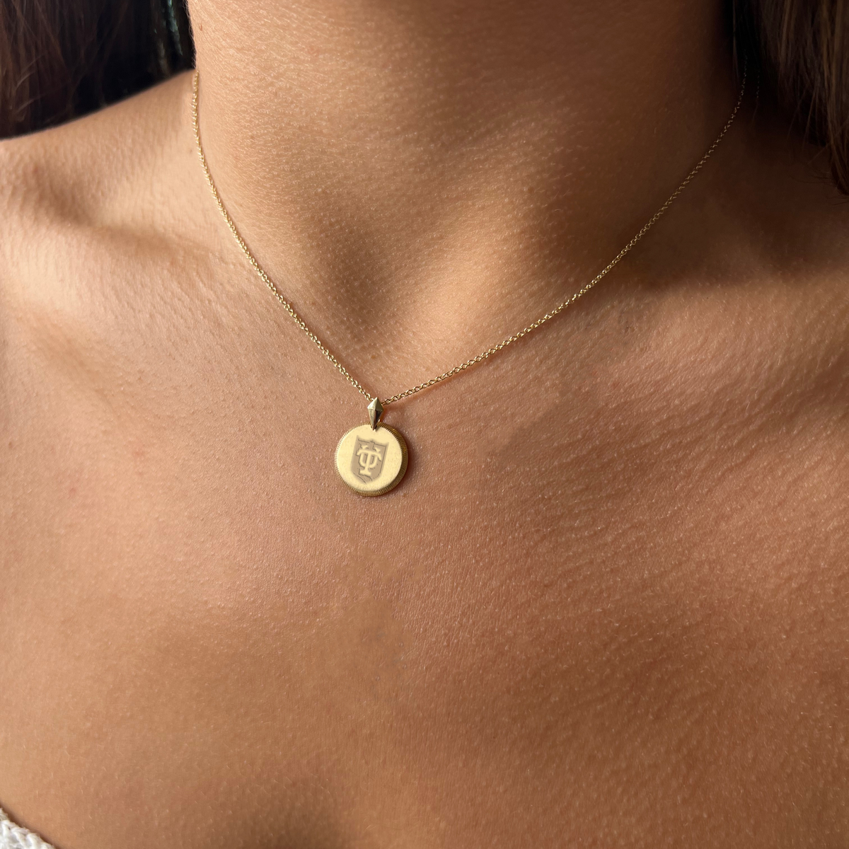 Tulane Florentine Necklace Petite shown on figure in gold