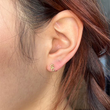 USC SC Stud Earring shown on figure in gold