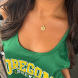 Oregon Sunburst Pendant shown on figure in gold on Cable Chain