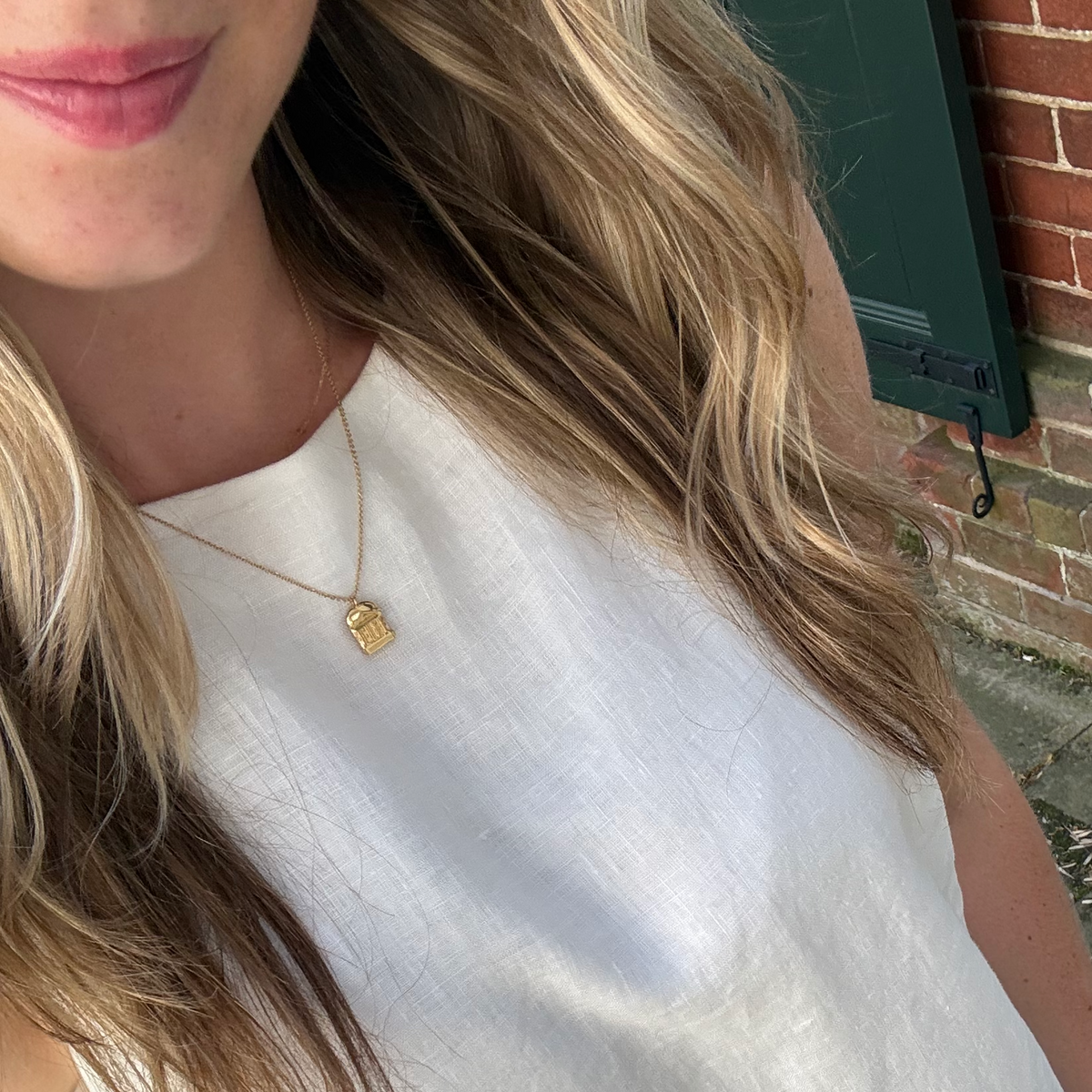 UVA Rotunda Necklace shown on figure in gold