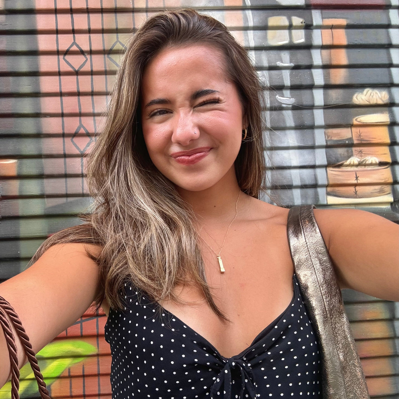 UT Tower Pendant shown on figure in gold on Cable Chain