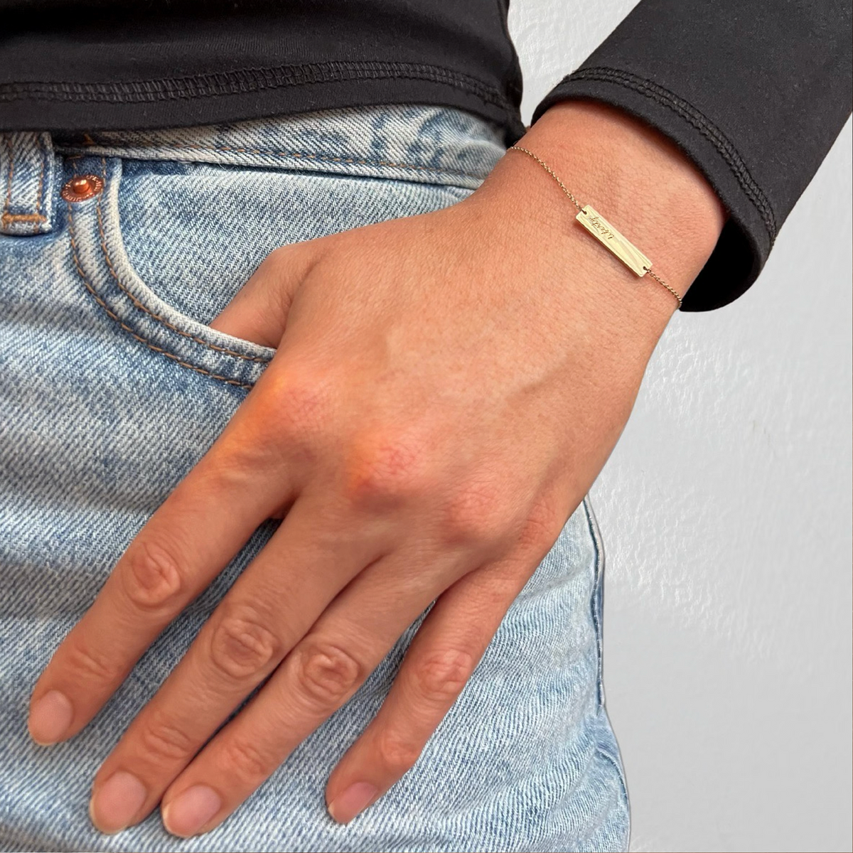 Liberty Bracelet shown on figure in gold