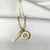 Notre Dame Sunburst shown in gold on Link Chain with Coordinates Bar laydown