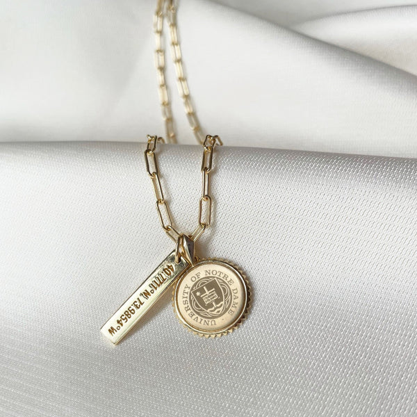 Notre Dame Sunburst shown in gold on Link Chain with Coordinates Bar laydown