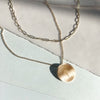 NYU Torch Necklace shown in gold with Link Chain laydown