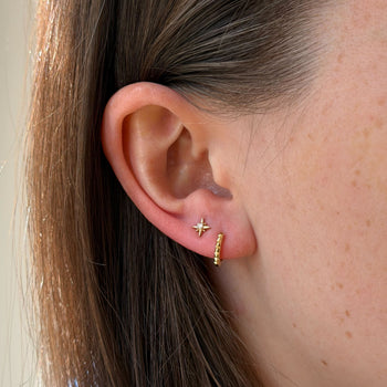 North Star Sunburst Earring Bundle shown on figure in gold
