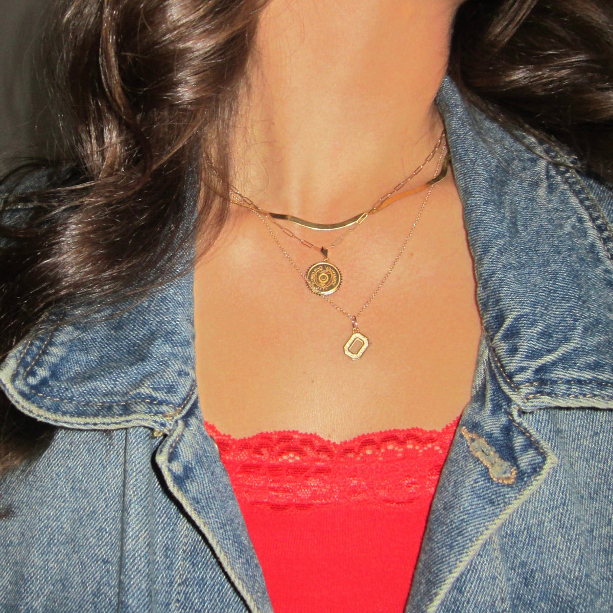 Ohio State Seal Sunburst Pendant shown on figure in gold on Link Chain with Ohio State Logo Charm on Cable Chain