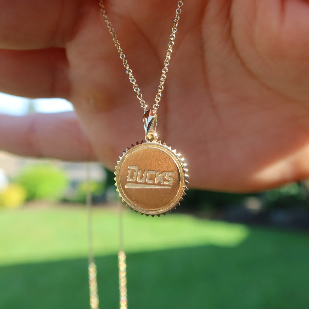 Oregon Softball 60th Anniversary Sunburst Pendant