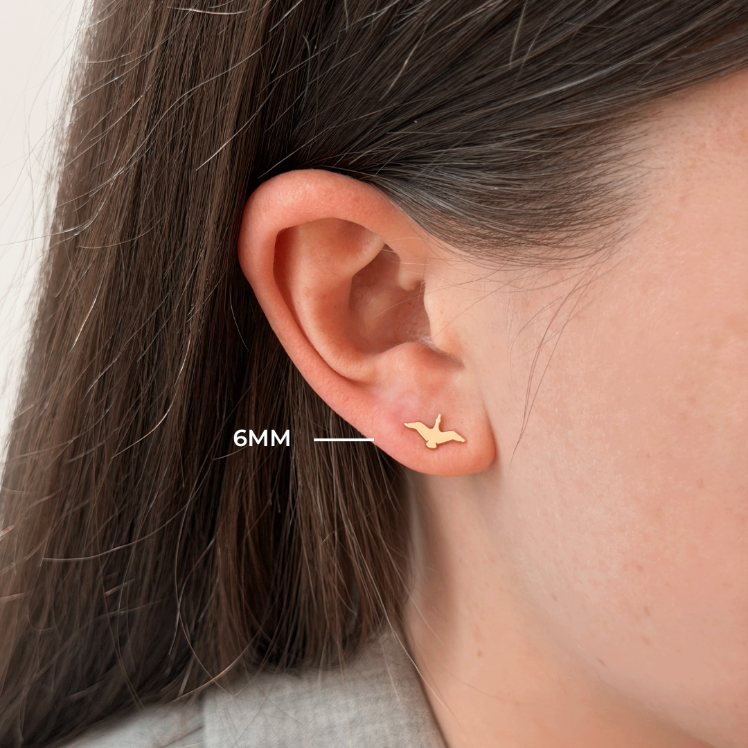 Oregon Flying Duck Stud 6mm shown on figure in gold