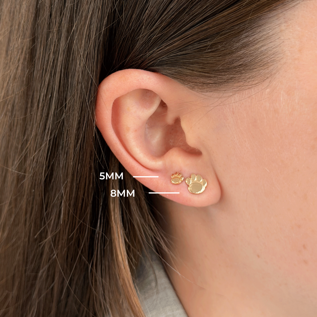 Penn State Paw Studs 5mm and 8mm shown on figure in gold