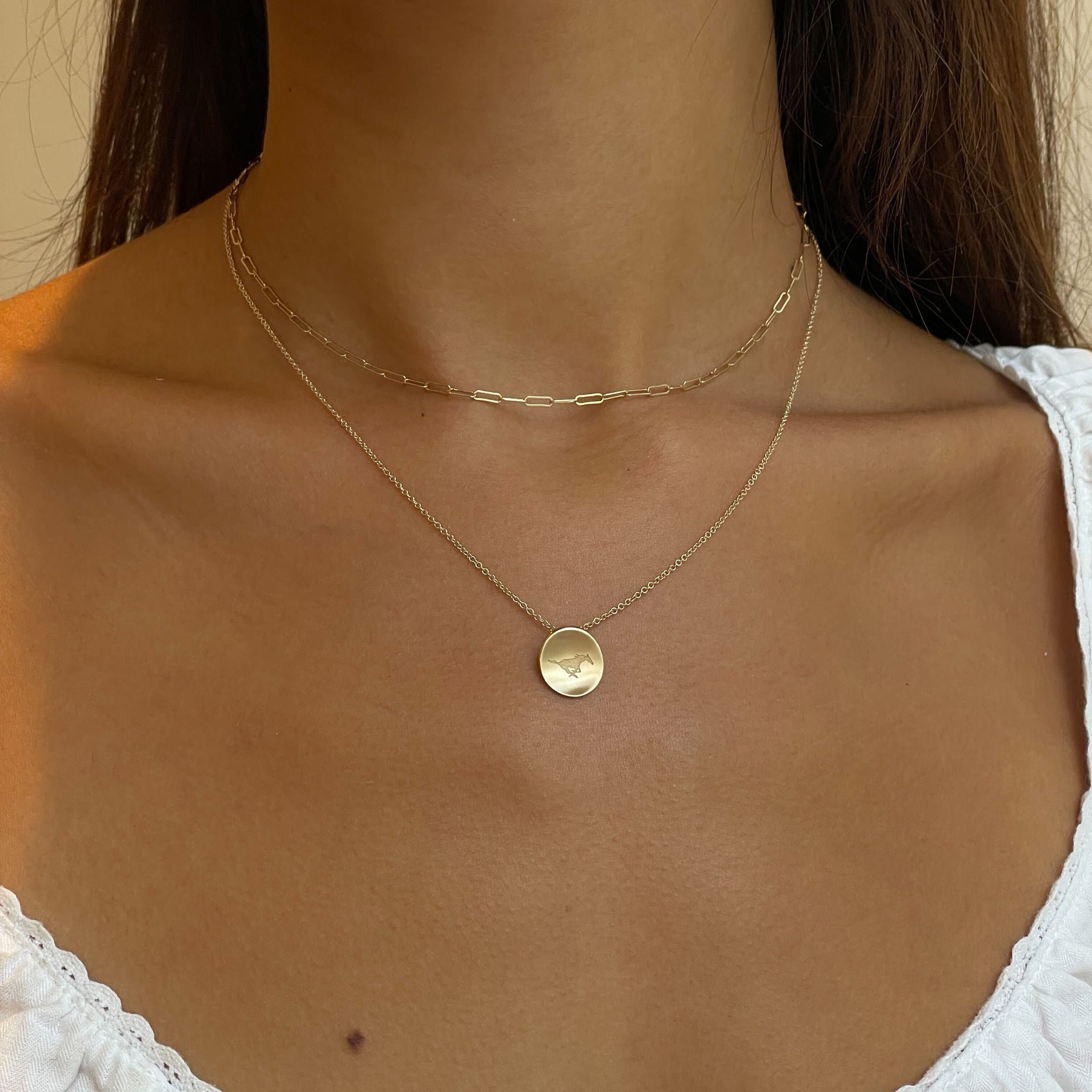 SMU Peruna Necklace shown on figure in gold with Link Chain Choker