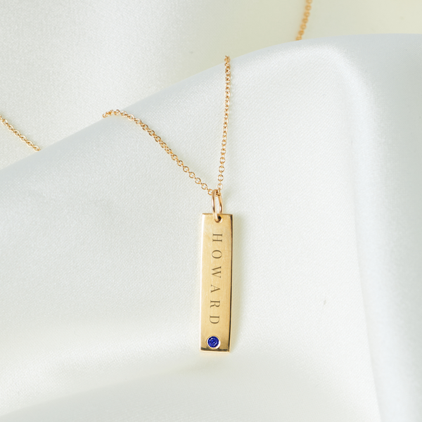 Howard Sapphire Gemstone Bar laydown shown in gold on cable chain