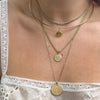 Seashell Charm shown on Neck Collar in gold