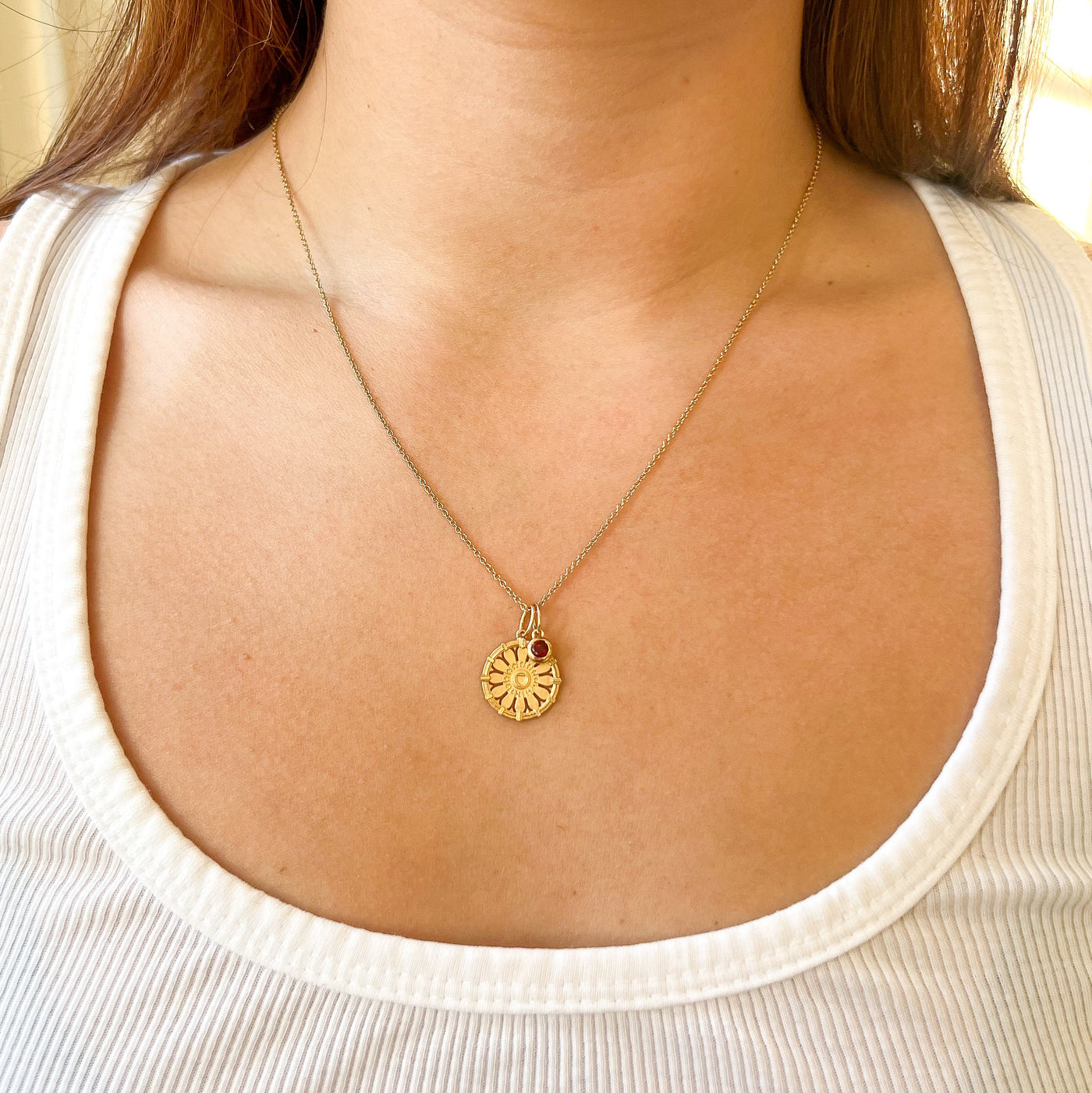 St. Lawrence Herring-Cole Rose Window Bundle shown on figure in gold