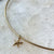 Starfish Charm shown on Neck Collar in gold