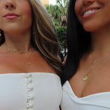 UMiami Logo Charm shown on figure on Cable Chain in gold with UMiami Sunburst Bundle in gold