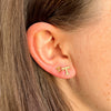 Tennessee T Stud Earring shown on figure in gold in size 5mm and size 8mm