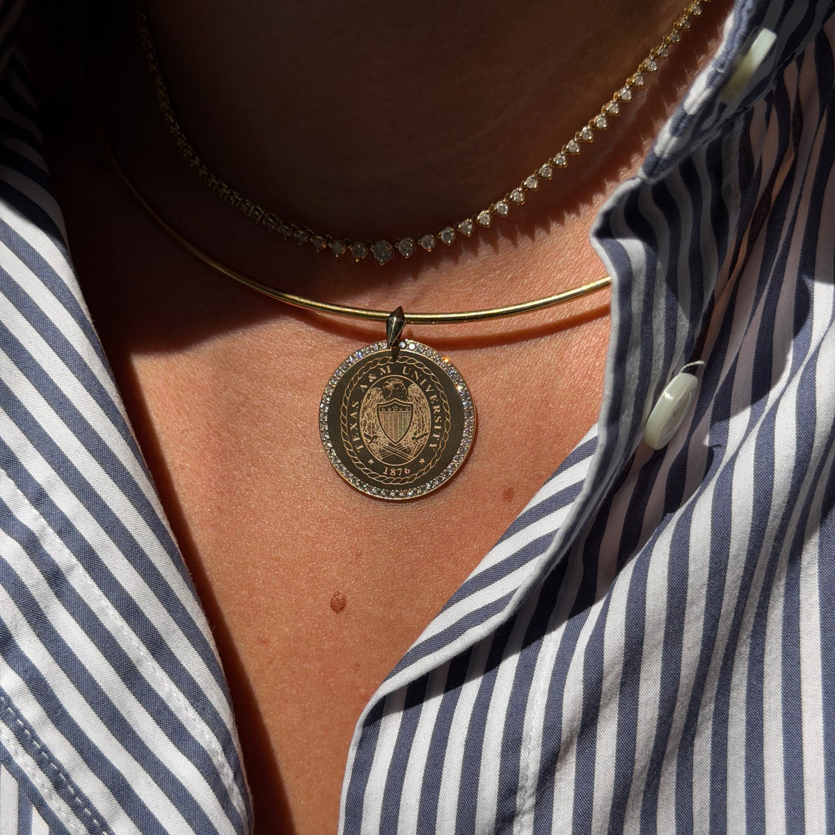 Texas A&M Diamond Florentine Pendant shown on figure on Neck Collar in gold