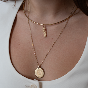 UConn Logo Charm shown on figure in gold on Neck Collar with UConn Large Florentine Pendant in gold on Link Chain