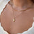 UVA Rotunda Pendant shown on figure in gold on Cable Chain with Neck Collar in gold