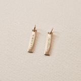 2026 Grad Layering Bar shown with In Itinere back engraving