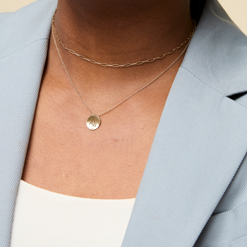 Kentucky Dance Blue Ribbon Organic Necklace shown on figure in gold