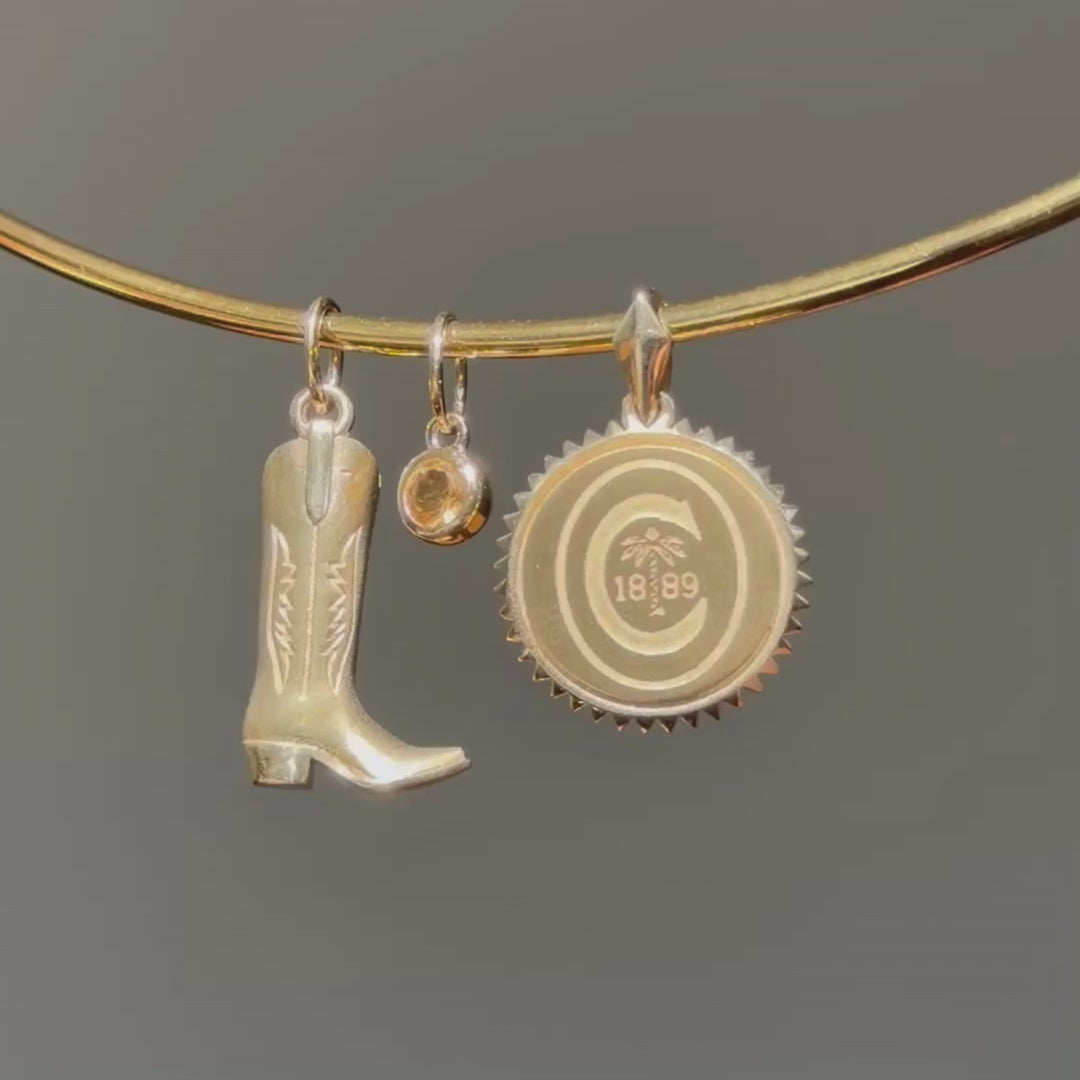 Cowboy Boot Charm shown on Neck Collar with Citrine Gemstone Charm and Clemson Sunburst Pendant in gold