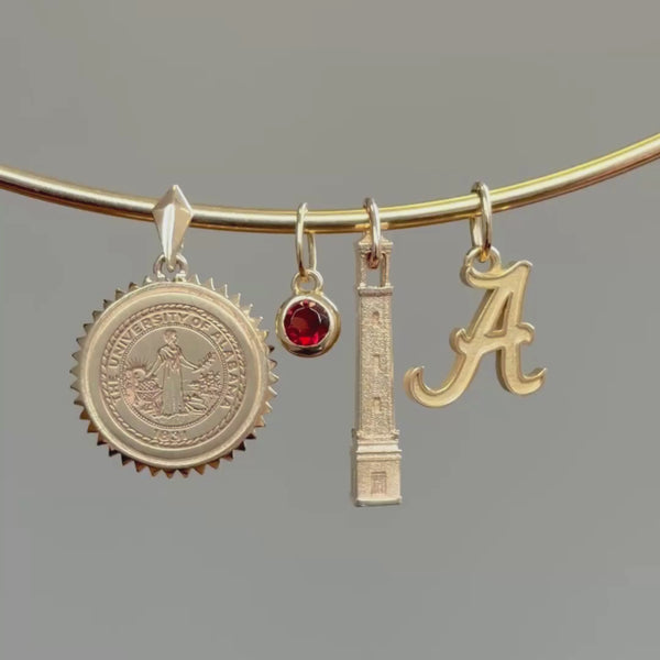 Alabama Sunburst Pendant, Garnet Gemstone Charm, Alabama Denny Chimes Pendant, and Alabama Logo Charm shown on Neck Collar in Gold