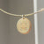 FSU Large Florentine Pendant shown on Neck Collar in gold